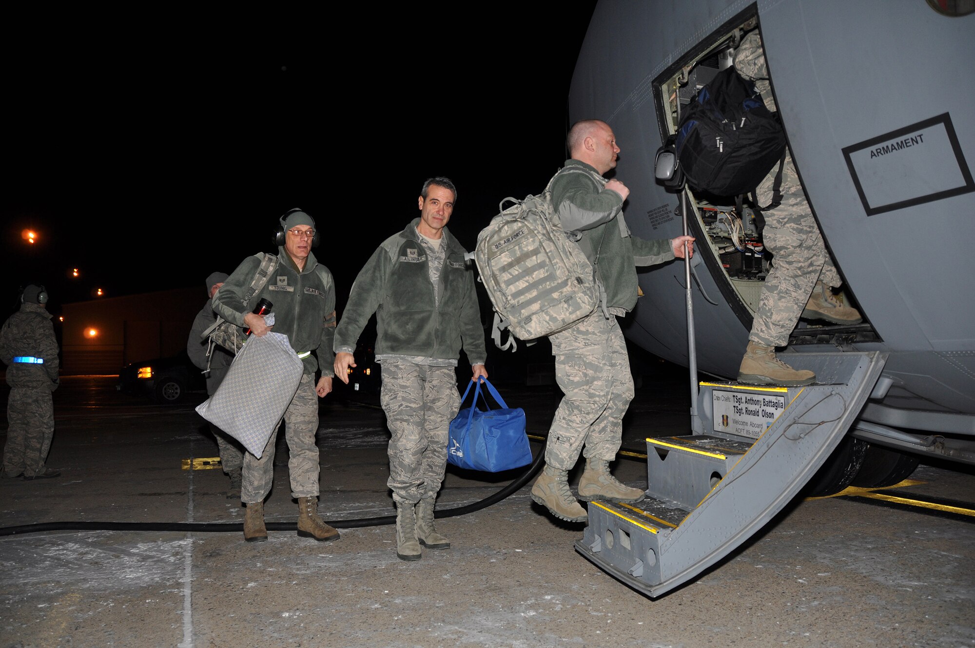 Airmen from the 914th Airlift Wing board a C-130 at the Niagara Falls Air Reserve Station N.Y. February 2, 2013 to relieve fellow Airmen who are supporting Operation Coronet Oak in Puerto Rico. The first group of Airmen returned to Niagara later in the day after a two-week temporary duty assignment there. Coronet Oak is an all-Reserve and Guard operation, providing airlift support in Central and South America. (U.S. Air Force photo by Staff Sgt. Stephanie Clark)