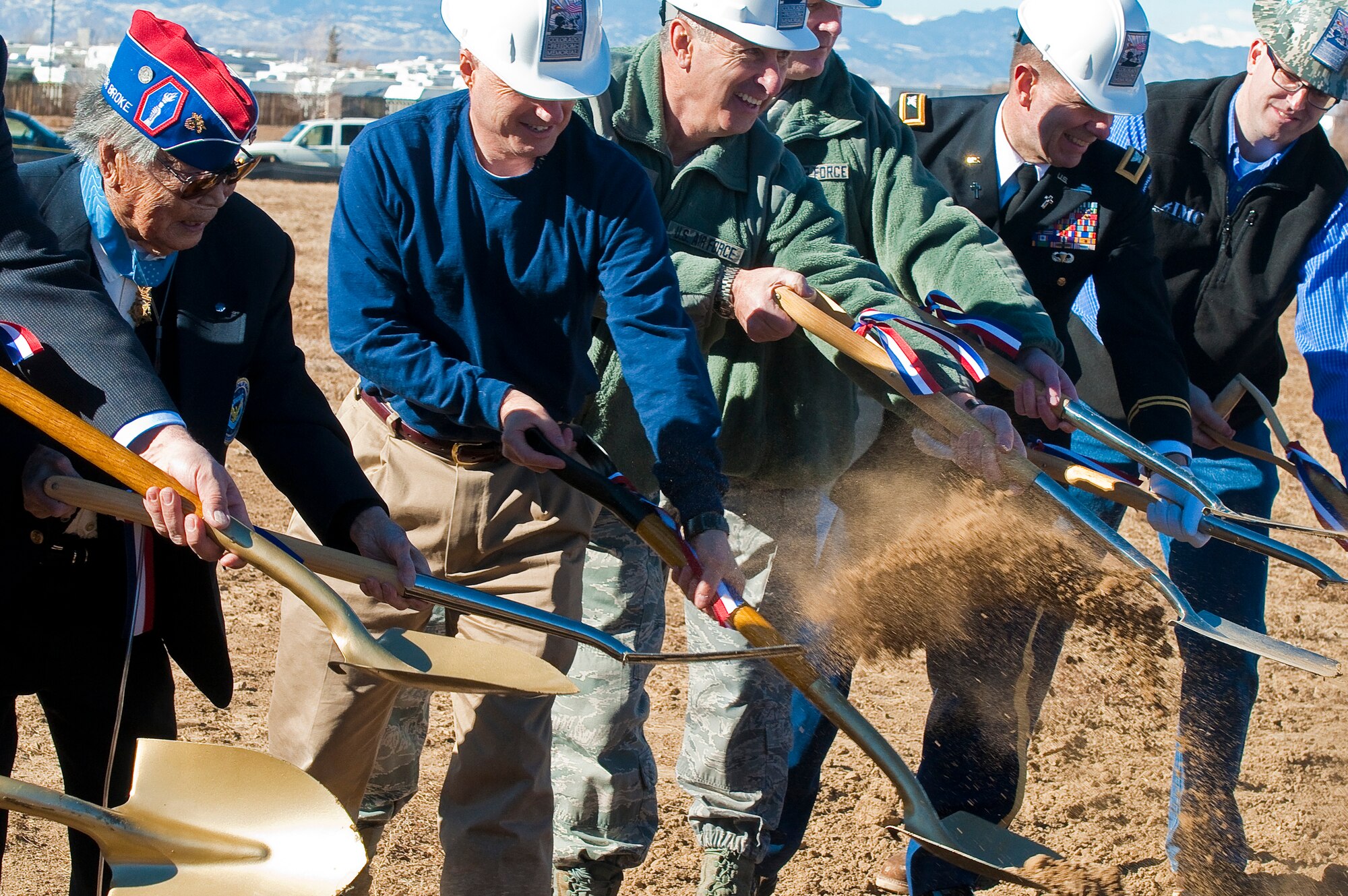 Ground is broken for the Colorado Freedom Memorial Feb. 2, 2013, in Aurora, Colo. The memorial is a 12-year effort led by Rick Crandall and members for the CFM Foundation. The memorial will list the names of all Colorado service members who died during combat operations on foreign soil since Colorado became a state. The first member named is Pvt. Fred Springstead, a Colorado National Guard member who was killed by a sniper during the Spanish-American War. He was also one of the first 10 Americans to be killed in that war. His comrades not only went on to capture Manila, but upon their return to Colorado, they formed the Veterans of Foreign Wars, naming Denver VFW Post 1. (Colorado Air National Guard photo by Capt. Darin Overstreet/Released)