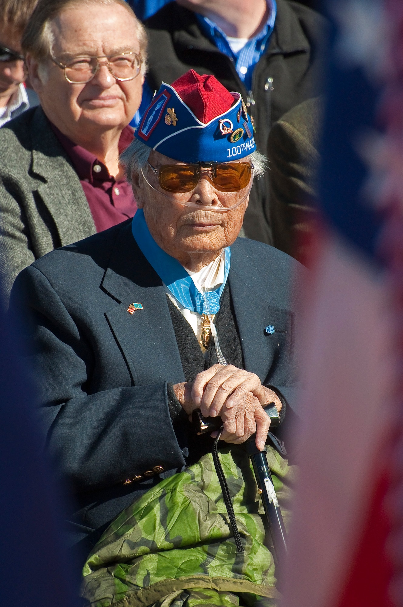 Pvt. George Sakato, World War II Medal of Honor recipient, watches the groundbreaking ceremony for the Colorado Freedom Memorial Feb. 2, 2013, in Aurora, Colo. The memorial is a 12-year effort led by Rick Crandall and members for the CFM Foundation. The memorial will list the names of all Colorado service members from all branches and all wars who died during combat operations on foreign soil since Colorado became a state. This is the first memorial of its kind, which names members from all service branches and all wars. (Colorado Air National Guard photo by Capt. Darin Overstreet/Released)