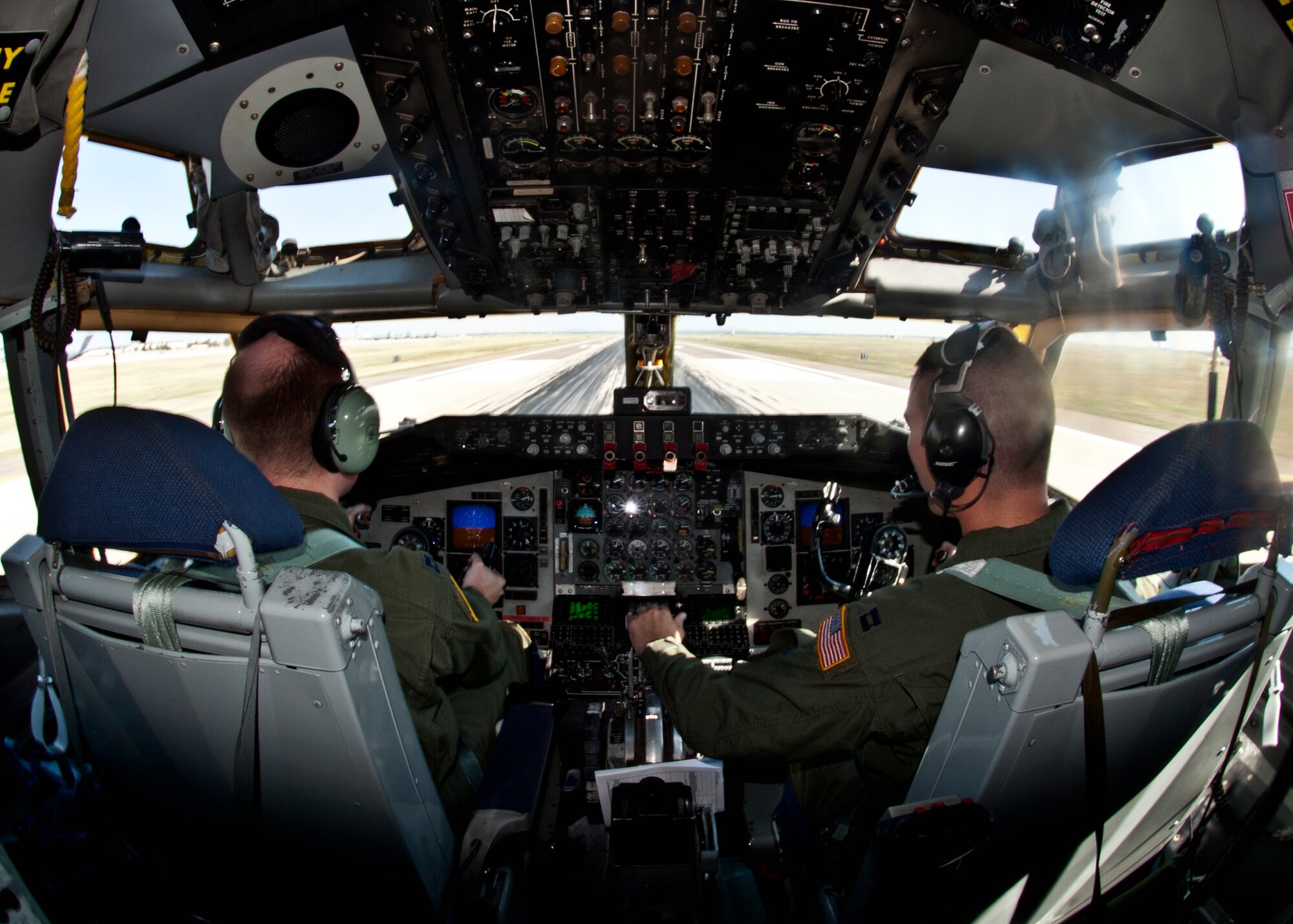 ALTUS AIR FORCE BASE, Okla. – Pilots from the 54th Air Refueling Squadron adjust the control of a KC-135 Stratotanker during take-off Aug. 29, 2012. The pilots were departing to refuel a B-2 Spirit Stealth Bomber as part of a training mission. (U.S. Air Force photo by Airman 1st Class Franklin Ramos / Released)