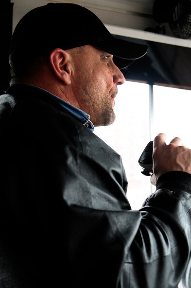Roland Porst, 86th Vehicle Readiness Squadron bus driver, communicates with dispatch while driving the base shuttle on Ramstein Air Base, Germany, Jan. 30, 2013. The base shuttle runs from 6 a.m. to 6 p.m. to allow Airmen and family members to get to appointments or across base during the day. (U.S. Air Force photo/Airman 1st Class Hailey Haux)