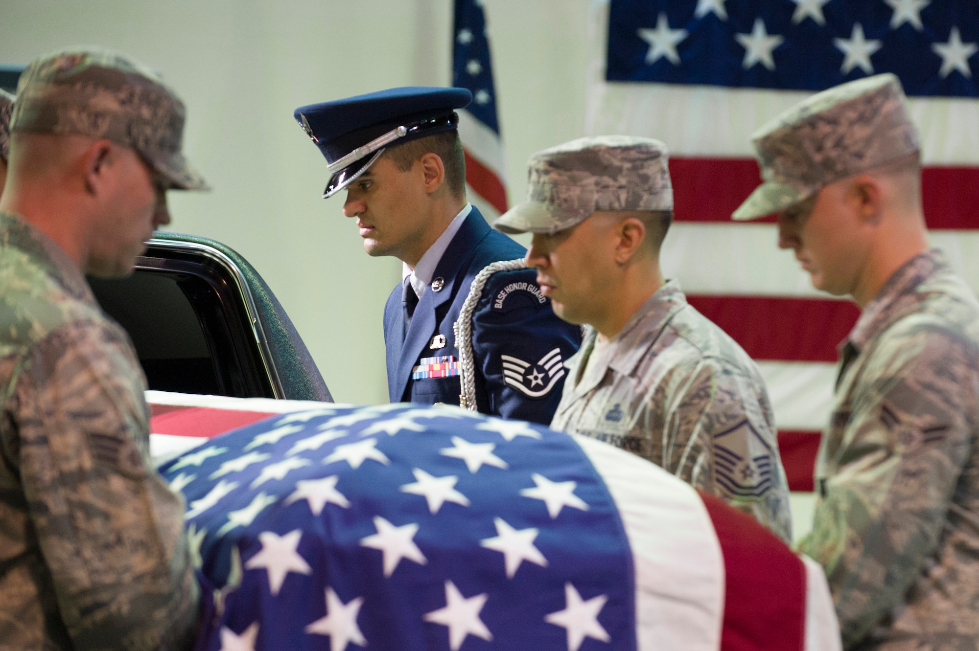 Red Flight Honor Guard Noncommissioned Officer of the Year nominee, Staff Sgt. Jeremy Hale, AFTAC, leads the team to retrieve the casket from the hearse and prepares to begin pall bearing during the Honor Guard Airman of the Year Board, which consisted of a total of 8 nominees competing in the Airman, Noncommissioned Officer and Company Grade Officer categories. Participants had a uniform inspection, answered a series of questions and performed in a scenario unknown to them until the board presented it. (U.S. Air Force Photo/Matthew Jurgens.)