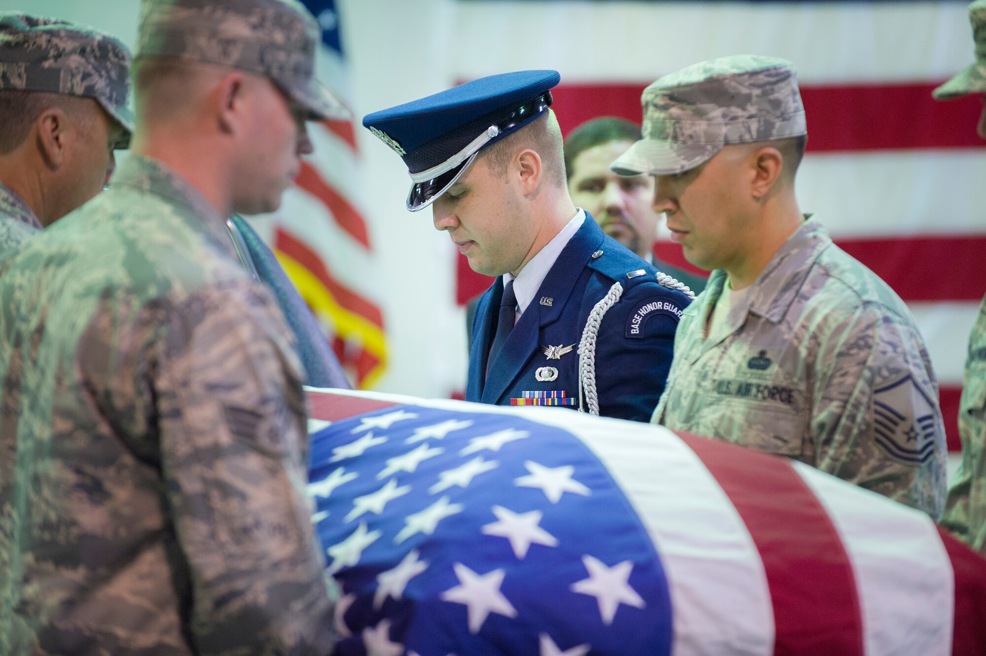 White Flight Honor Guard Company Grade Officer of the Year nominee, 1st Lt Gavin Brawley, 5 SLS, marches the team to retrieve the casket from the hearse and positions the team to take the casket during the Honor Guard Airman of the Year Board, which consisted of a total of 8 nominees competing in the Airmen, noncommissioned officer and Company Grade Officer categories. Participants had a uniform inspection, answered a series of questions and performed in a scenario unknown to them until the board presented it. (U.S. Air Force Photo/Matthew Jurgens.)
