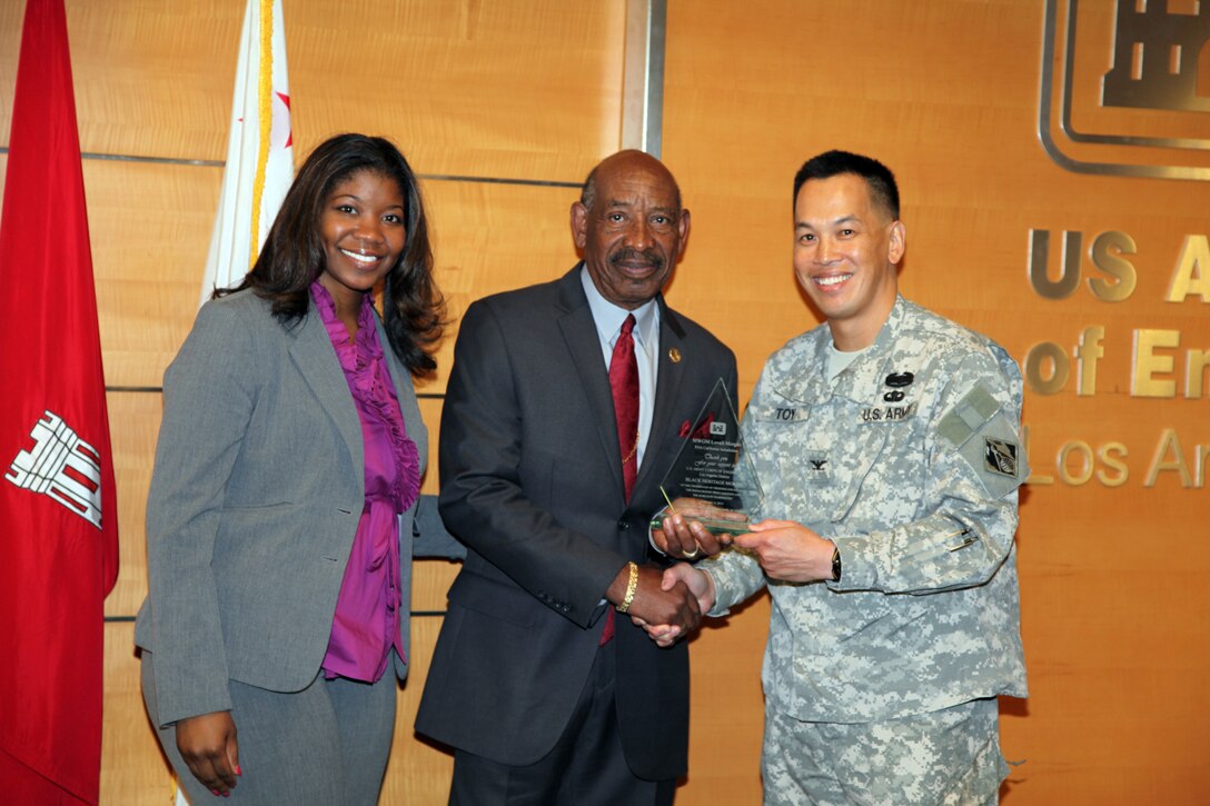Col. Mark Toy, District commander, Los Angeles district, Corps of Engineers, and Arnecia Williams, BEP program manager presents keynote speaker, Lowell Morgan with an Award for his participation in the Black Employment Special Emphasis Program (BEP) Committee’s Black History Month kick-off, ceremony held at the district conference room, Feb. 4 in Los Angeles, Calif.  The ceremony was held in the District’s 12th floor conference room-the site of all scheduled 2013 BHM events this month.