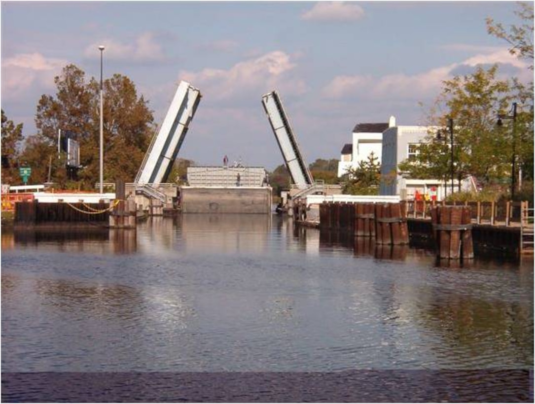 Barge going up the North Prong of the Wicomico River, through the Main Street and Route 50 Drawbridges in Salisbury, Maryland.
