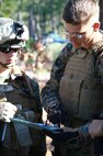 Cpl. Jacob A. Richardson, a native of Maysville, N.C., and student at 2nd Marine Logistics Group’s Corporals Course, reviews his squad’s route for an upcoming patrol during a training exercise aboard Camp Lejeune, N.C. Feb. 5, 2013. Richardson served as a fire-team leader for the training, and helped lead his squad during a simulated engagement with a rival group of students. 