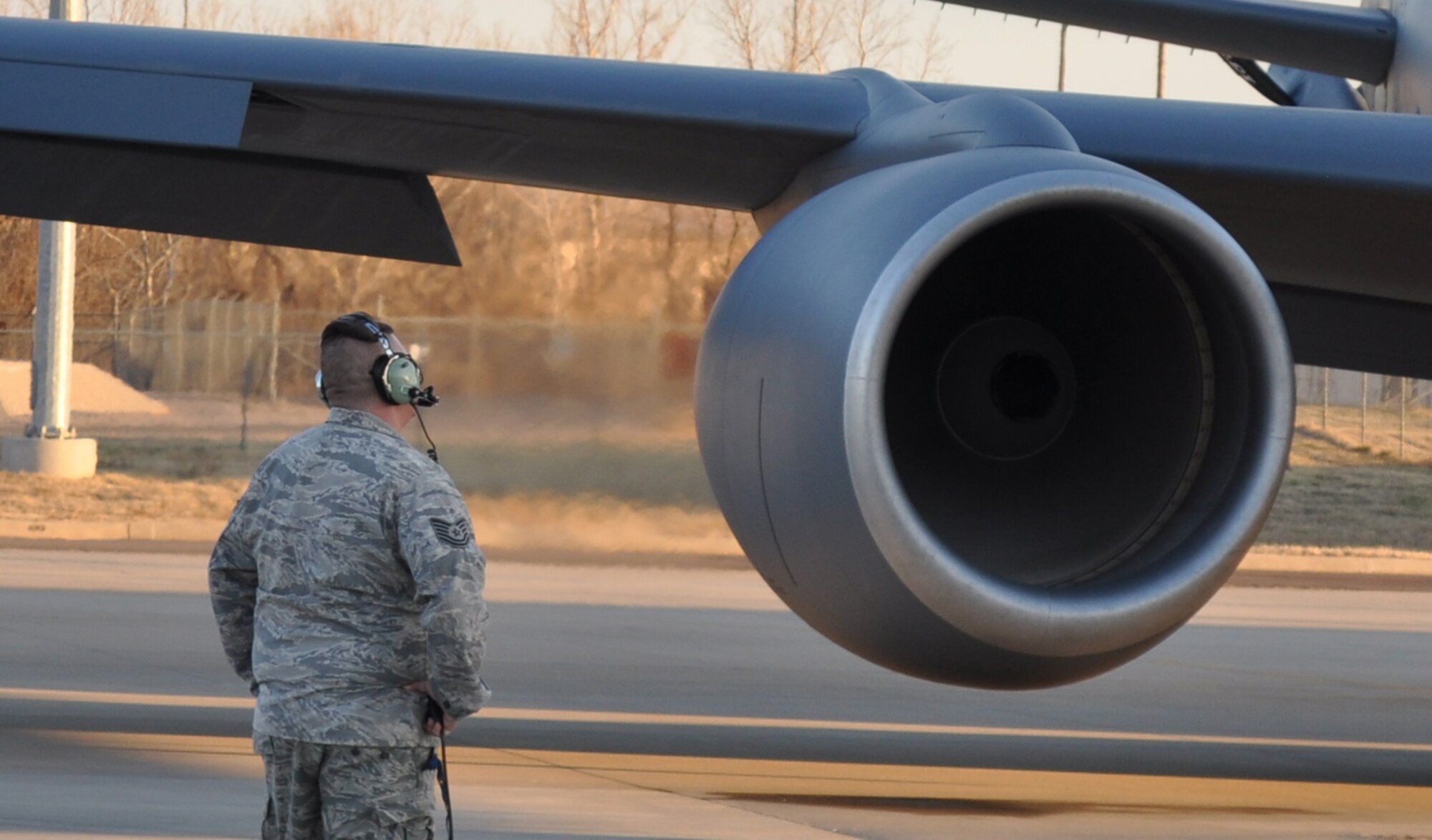 Tech Sgt. Jonathan Sanders monitors engine start up here Wednesday for a 137th Air Refueling Wing, Oklahoma Air National Guard evening mission Feb. 6.   The mission of the 137th ARW and 507th ARW continues daily providing air refueling worldwide.  (U.S. Air Force Photo by Capt. Jon Quinlan)