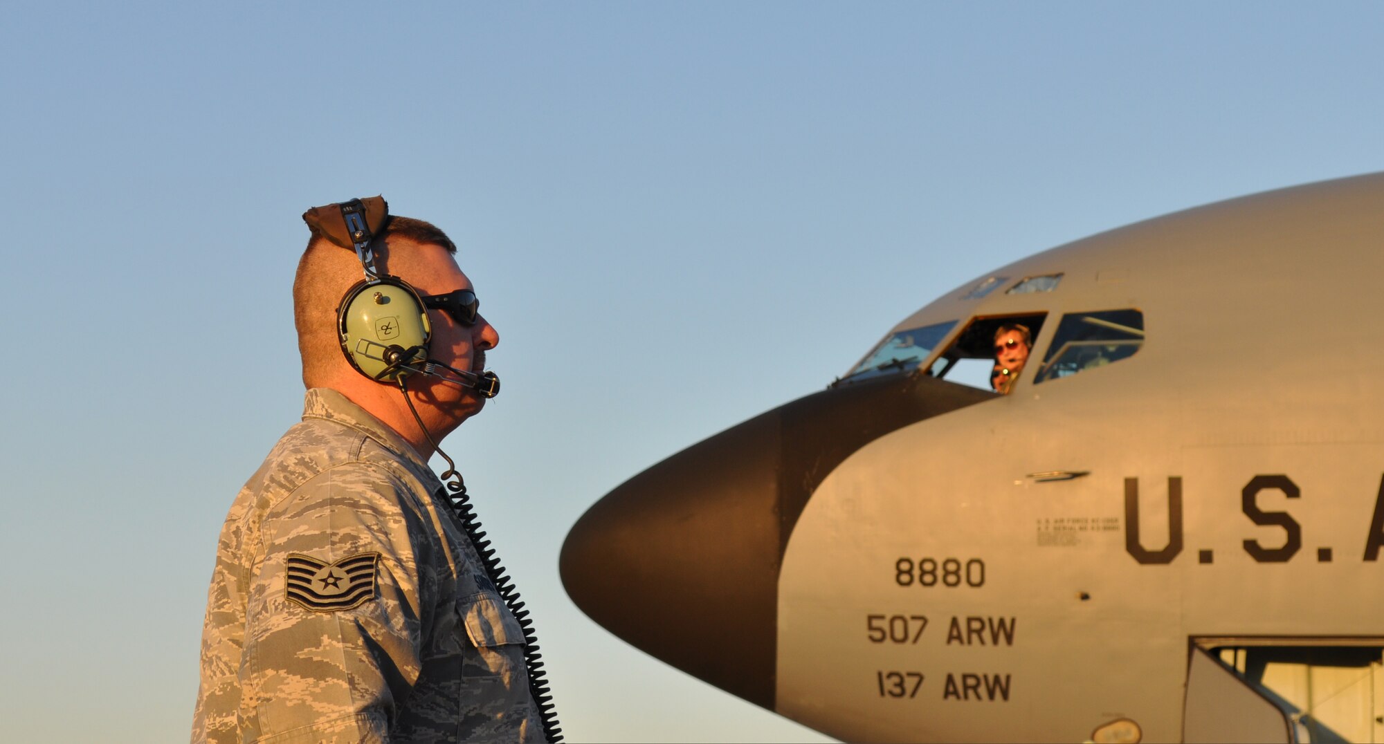 Tech Sgt. Jonathan Sanders monitors engine start up here Wednesday for a 137th Air Refueling Wing, Oklahoma Air National Guard evening mission Feb. 6.   The mission of the 137th ARW and 507th ARW continues daily providing air refueling worldwide.  (U.S. Air Force Photo by Capt. Jon Quinlan)