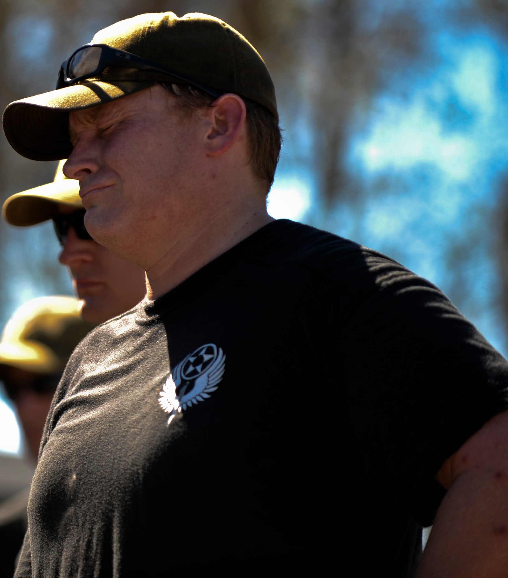 Maj. Mitchell Sherman, 1st Special Operations Wing Air Commando, mourns the loss of fallen heroes at the U.S. Special Operations Command memorial wall at MacDill Air Force Base Fla., Feb. 8, 2013. Sherman and fifteen other members of the Air Commandos took part in a  450-mile fallen hero rememberance ruck-march that  began on the Emerald Gulf Coast and ended at MacDill AFB. (U.S. Air Force photo by Staff Sgt. Brandon Shapiro/Released)