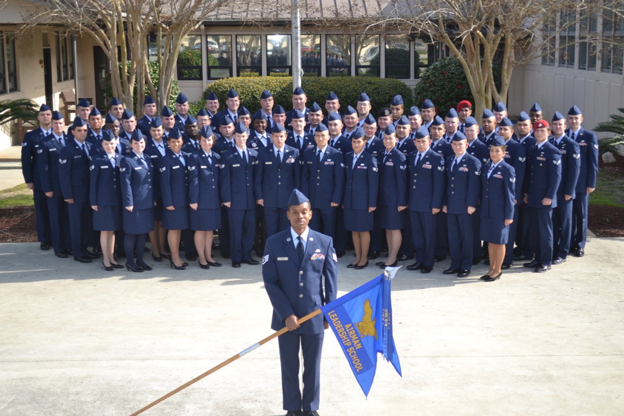 Staff sergeants and senior airmen from Class 13-B of the Vincent Airman Leadership School pose in front of the school at Hurlburt Field, Fla. The class graduated from ALS during a ceremony at the Soundside Club at Hurlburt Field, Fla., Feb. 7, 2013. (Courtesy photo)
