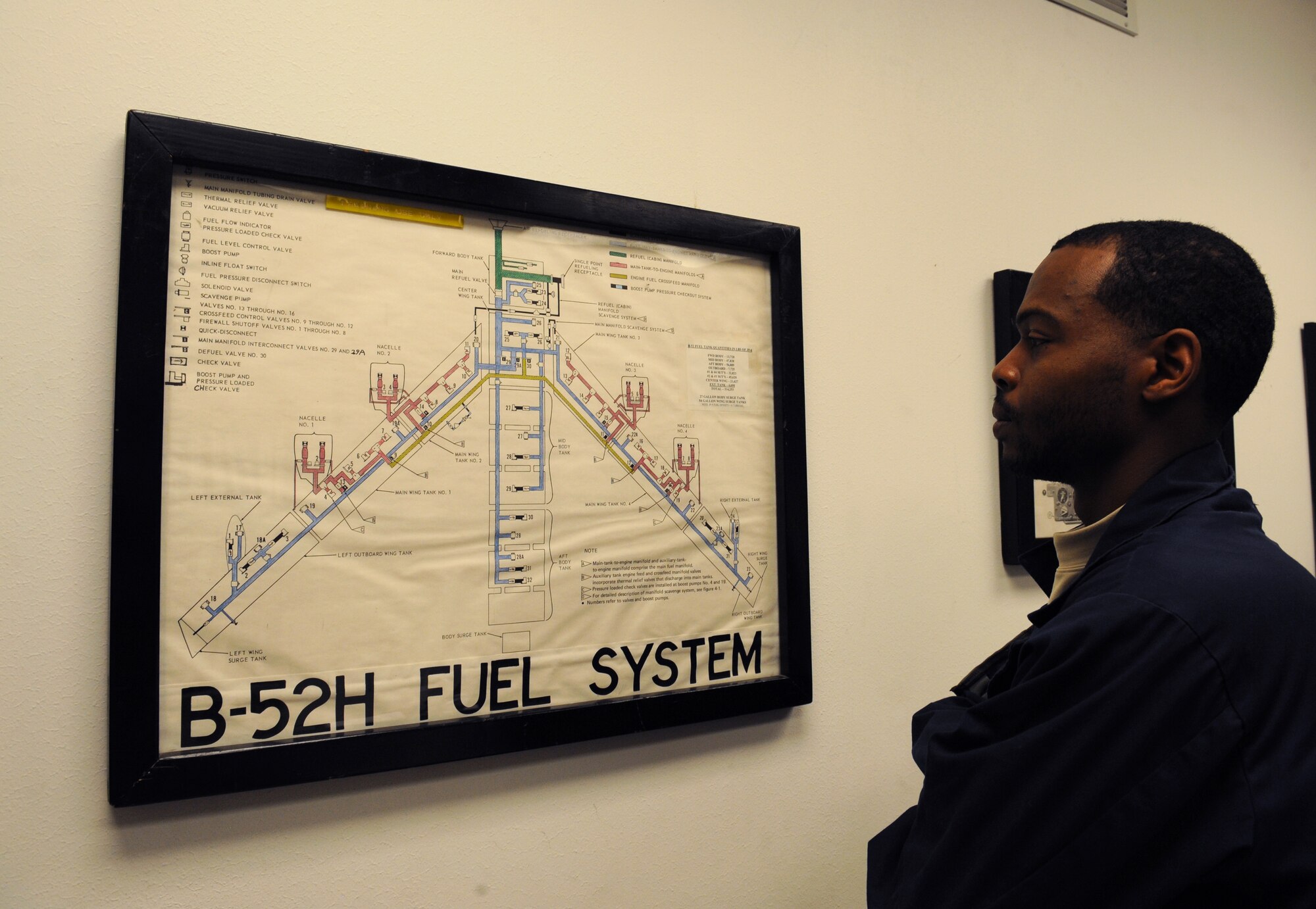Staff Sgt. Keith Cobb, 2nd Maintenance Squadron fuels systems craftsman, views a diagram of a B-52H Stratofortress fuels systems on Barksdale Air Force Base, La., Feb. 8. Airmen in the fuels section have the responsibility of diagnosing and repairing various fuel systems and fuel tanks on the B-52. (U.S. Air Force photo/Airman 1st Class Benjamin Gonsier)
