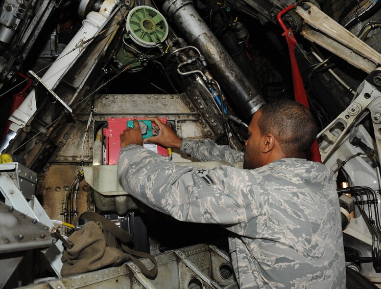 Airman 1st Class John Hunt, 2nd Maintenance Squadron fuels systems, connects a battery to a B-52H Stratofortress on Barksdale Air Force Base, La., Feb. 8. During fuels systems maintenance, the batteries are disconnected in the off chance the power is accidentally turned on. Airmen in the fuels section have the responsibility of diagnosing and repairing various fuel systems and fuel tanks on the B-52. (U.S. Air Force photo/Airman 1st Class Benjamin Gonsier)
