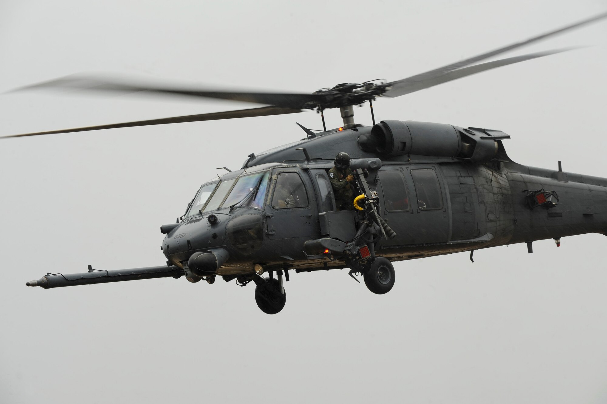 An HH-60G Pave Hawk from the 41st Rescue Squadron flies over Grand Bay Bombing and Gunnery Range during a combat search and rescue demonstration at Moody Air Force Base, Ga., Feb. 7, 2013. The demonstration showed the rescue aspect of Moody’s mission. (U.S. Air Force photo by Airman 1st Class Olivia Bumpers/Released)