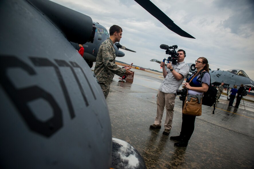 Kristen Edgel and Dave Gedney, National Geographic journalists, interview U.S. Air Force Capt. Eric Hansen, 38th Rescue Squadron combat rescue officer, Feb. 7, 2013, at Moody Air Force Base, Ga. Hansen and his unit were part of a deployment to Kandahar, Afghanistan, where a National Geographic production crew documented their mission for a six-part television series “Inside Combat Rescue.” (U.S. Air Force by Staff Sgt. Jamal D. Sutter/Released)  