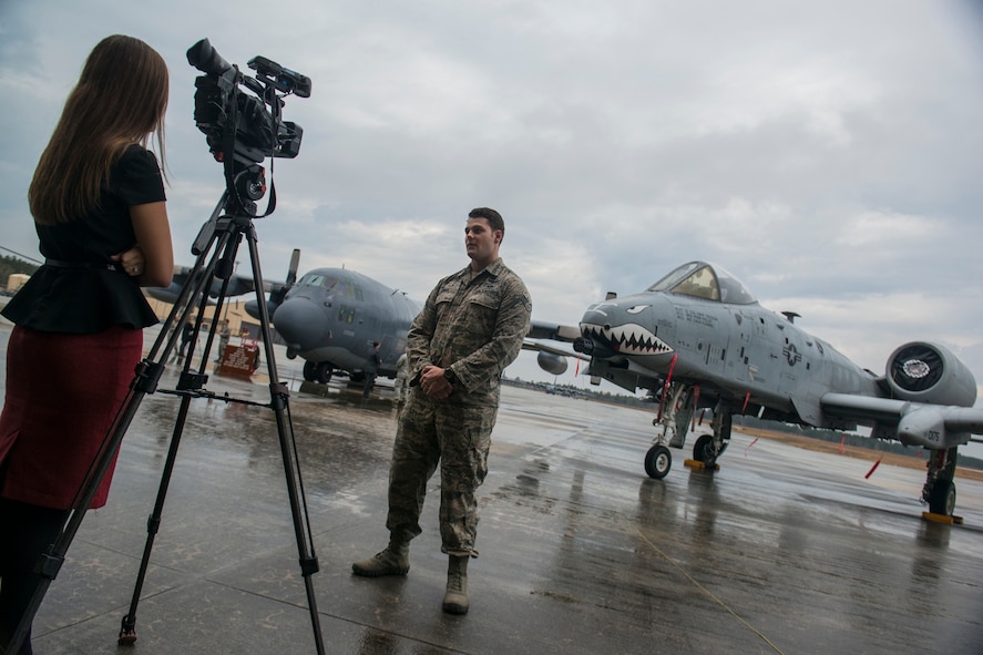 Lydia Jennings, WALB reporter from Valdosta, Ga., interviews U.S. Air Force Senior Airman Gerald Creel, 38th Rescue Squadron pararescueman, Feb. 7, 2013, at Moody Air Force Base, Ga. The interview was part of a day of events leading to the premiere of National Geographic’s “Inside Combat Rescue,” a six-part television series featuring Airmen assigned to Moody. (U.S. Air Force by Staff Sgt. Jamal D. Sutter/Released)