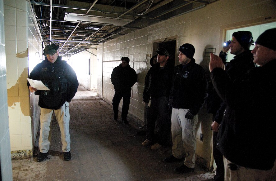 Members of the 436th Civil Engineer Squadron conducted an Explosive Ordnance Disposal (EOD) training event at Dover Air Force base, Del. on Feb. 7, 2013. The training allowed the Air Force EOD team to gain valuable training using live explosives during simulated events that mirror recent real-world scenarios encountered by EOD teams across the nation. The 436th CE Squadron also hosted regional law enforcement teams from the Delaware and New Jersey State Police. The civilian law enforcement and USAF teams exchanged ideas and best practices in the hands-on training to ensure all are safe and well prepared for the future. USAF photo/Greg L. Davis   