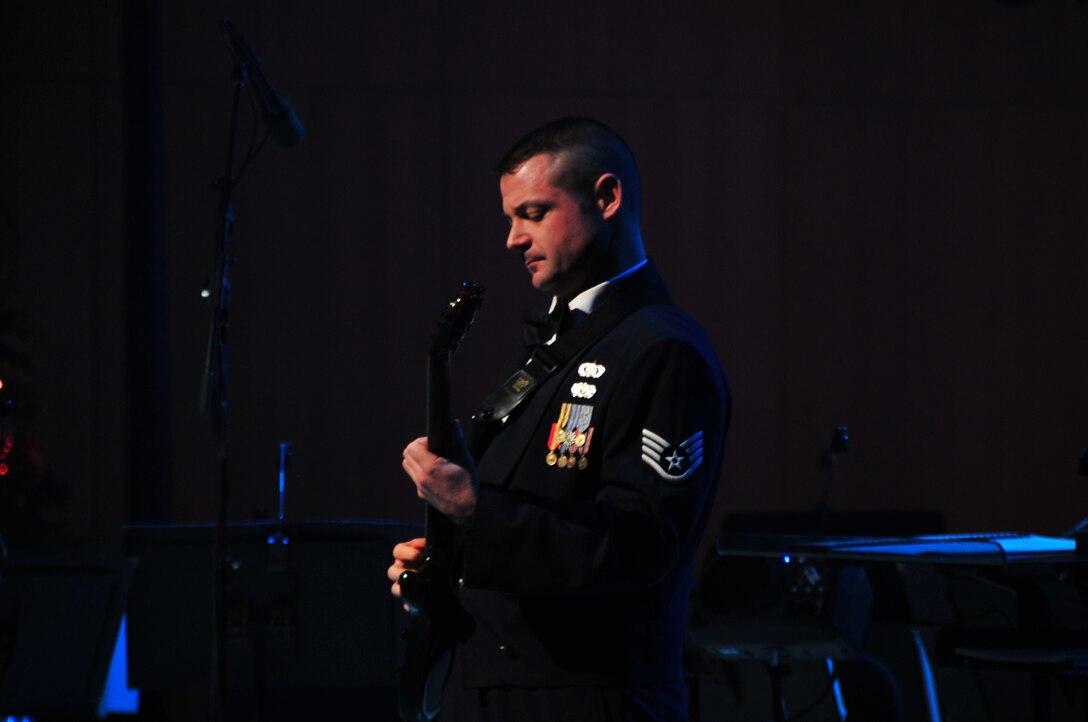 Staff Sergeant Dan Bragdon performs with Night Wing on "A Christmas Rock Medley"