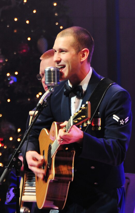 Airman First Class Lee Heerspink of Night Wing performs "Winter Wonderland"
