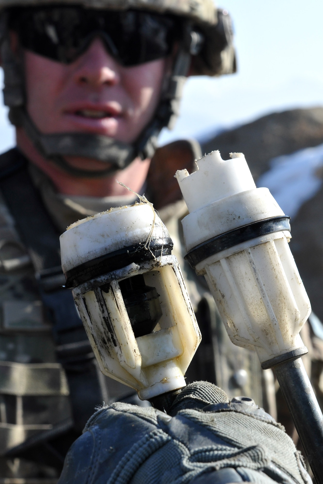 Members of the 777th Expeditionary Prime BEEF Squadron and the 755th Expeditionary Security Forces Squadron work on a broken water well located in a village near Bagram Airfield, Afghanistan, on Jan. 26, 2013. Most of the local villages’ water well problems can be solved with a simple repair, cleaning, or redevelopment. (U.S. Air Force photo/Senior Airman Chris Willis)
