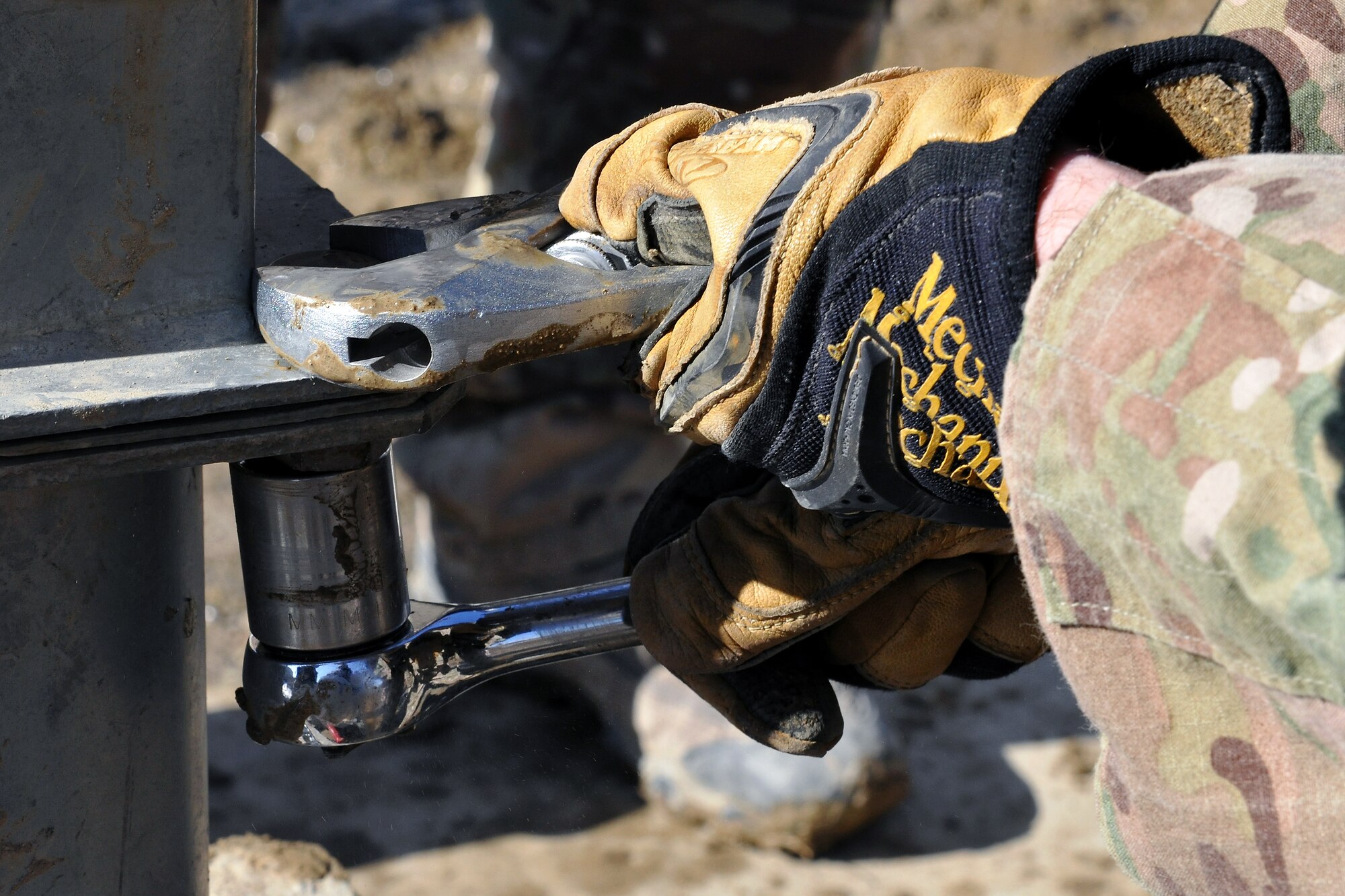 Members of the 777th Expeditionary Prime BEEF Squadron and the 755th Expeditionary Security Forces Squadron work on a broken water well located in a village near Bagram Airfield, Afghanistan, on Jan. 26, 2013. Most of the local villages’ water well problems can be solved with a simple repair, cleaning, or redevelopment. (U.S. Air Force photo/Senior Airman Chris Willis)
