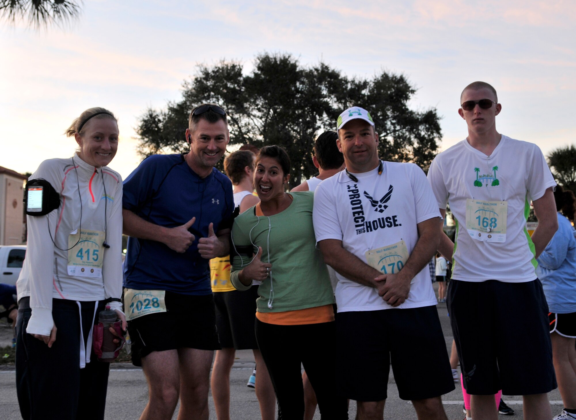 920th Rescue Wing Airmen woke up Sunday morning with one focus on their mind … conquer the Melbourne Marathon.  The Airmen along with 1000s of local and afar athletes participated in either a full 26.2 mile marathon or a 13.1 mile half marathon. Left to right; Master Sgt. Danielle Hueper, Chief Master Sgt. Tracy Winton, Senior Airman Mandy Forshaw, Tech Sgt. Thomas Cowan and his son Damian Cowan, all participated in the half marathon. (U.S. Air Force photo/Tech. Sgt. Peter Dean)