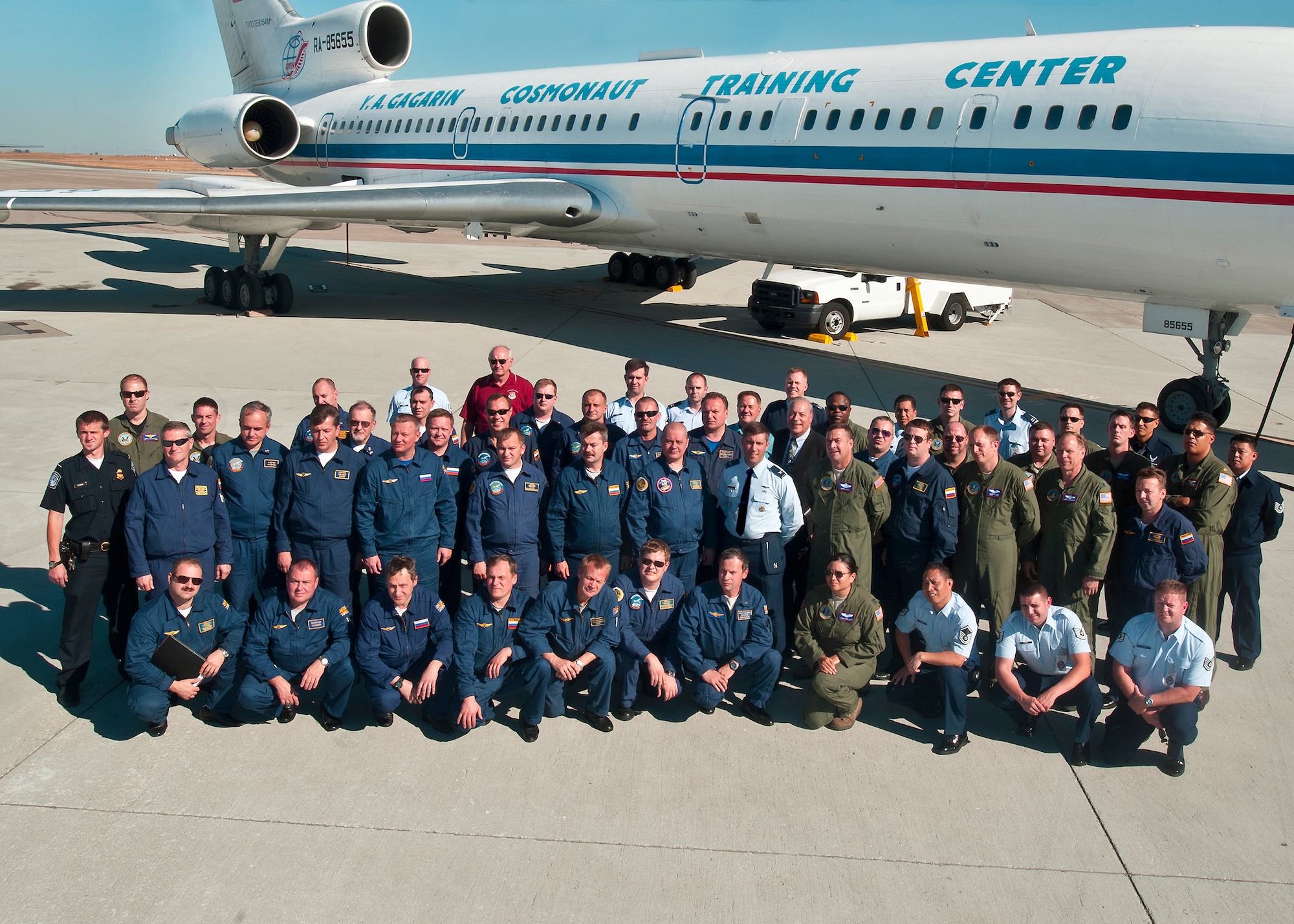 Travis Airmen Russian air force members pose for a photo Oct. 12, 2012, after landing at Travis Air Force Base, Calif. for an Open Skies visit. Open Skies is to promote openess, transparency and confidence amongst the member nations. (U.S. Air Force photo/T.C. Perkins)