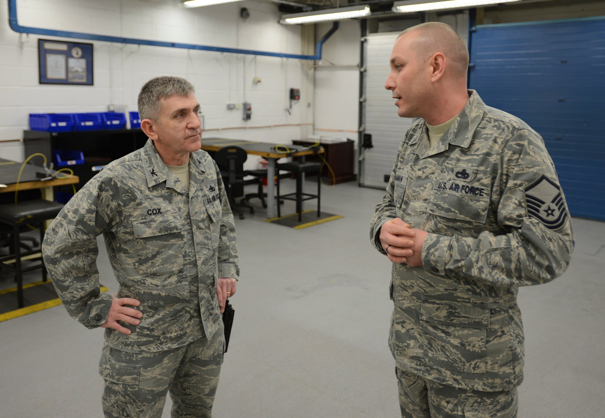 ROYAL AIR FORCE LAKENEHEATH, England - Master Sgt. David Willaman, 48th Component Maintenance Squadron accessories flight maintenance superintendent and native of Mooresville, Ind., talks to Col. Matthew Cox, 48th Maintenance Group commander, about the benefits of the new 48th CMS Egress Facility Feb. 5, 2013. The section, which maintains egress equipment such as ejection seats, moved to their new facility to increase production and alleviate safety concerns. (U.S. Air Force photo by Staff Sgt. Stephen Linch)