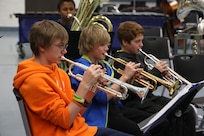 Jeffrey Stokes, Dillion Cromer and Alex Krauss play the trumpet at Randolph Middle school during a band practice Feb 1, 2013, at Joint Base San Antonio-Randolph. (U.S. Air Force photo by Joshua Rodriguez/ Released)