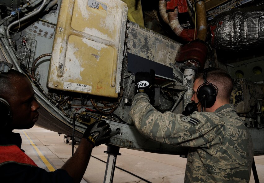 Airman 1st Class Keith Jackson, 707th Maintenance Squadron crew chief, and Senior Airman Jacob Cartwright, 2nd Aircraft Maintenance Squadron crew chief, conduct pre-flight checks on a B-52H Stratofortress shortly before take-off on Barksdale Air Force Base, La., Feb. 5. Airmen use pre-flight inspections to search for abnormalities or issues requiring emergency maintenance. (U.S. Air Force photo/Airman 1st Class Andrew Moua)