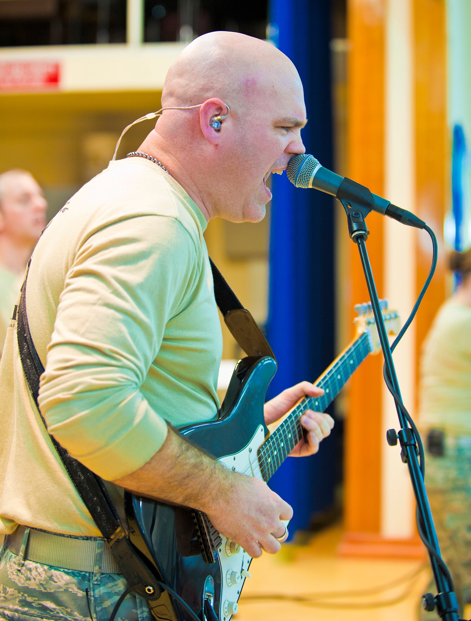 Tech. Sgt. Jason Cale, U.S. Air Forces in Europe Touch ‘N Go NCO in charge, performs during a concert at Incirlik Unit School Feb. 4, 2013, Incirlik Air Base, Turkey. Their song list covers the spectrum of popular music from R&B to country. (U.S. Air Force photo by Senior Airman Daniel Phelps/Released)