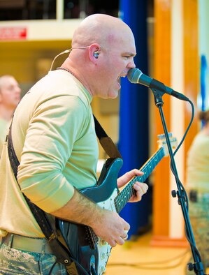 Tech. Sgt. Jason Cale, U.S. Air Forces in Europe Touch ‘N Go NCO in charge, performs during a concert at Incirlik Unit School Feb. 4, 2013, Incirlik Air Base, Turkey. Their song list covers the spectrum of popular music from R&B to country. (U.S. Air Force photo by Senior Airman Daniel Phelps/Released)