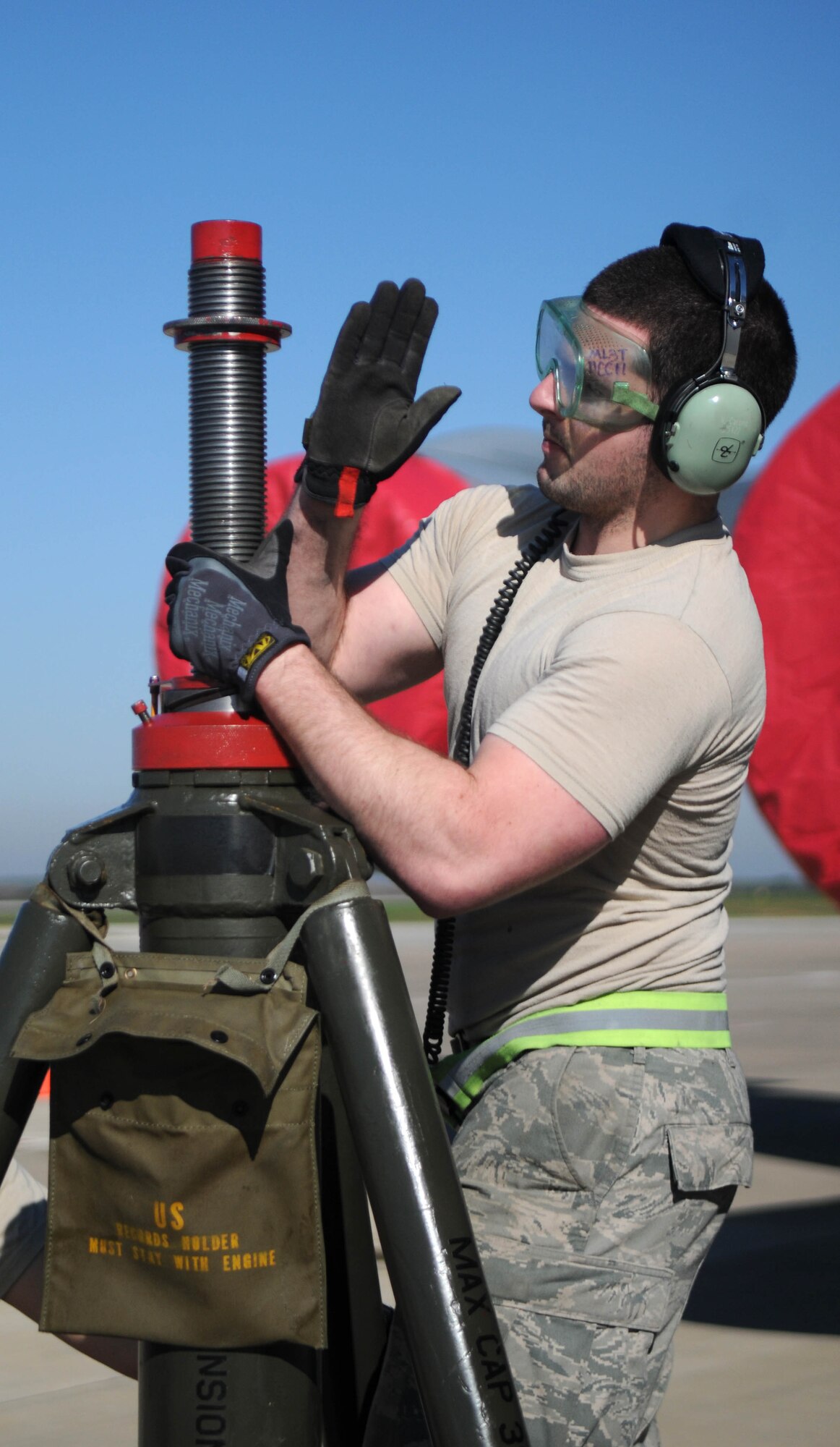 Staff Sgt. Nicholas Carone, 100th Aircraft Maintenance Squadron, makes adjustments to a locking mechanism on a hydraulic tripod jack under a KC-135 Stratotanker Feb. 5, 2013, at an air base in southwest Europe. Jacks allow maintainers to conduct tests involving raising and lowering the aircraft’s landing gear. Airmen from RAF Mildenhall, England, deployed to southwest Europe in January to support French operations in Mali. Carone is from Elk Grove, Calif. (U.S. Air Force photo by Staff Sgt. Austin M. May)