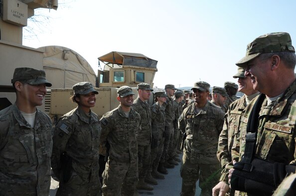 Air Force Chief of Staff Gen. Mark A. Welsh III and Chief Master Sgt. of the Air Force James Cody chat with Airmen of the 455th Expeditionary Security Forces Group at Bagram Airfield, Afghanistan, Feb. 6, 2013. Welsh and Cody visited as a part of a multi-base tour to meet with Airmen throughout the U.S. Central Command area of responsibility. (U.S. Air Force photo/Staff Sgt. David Dobrydney)