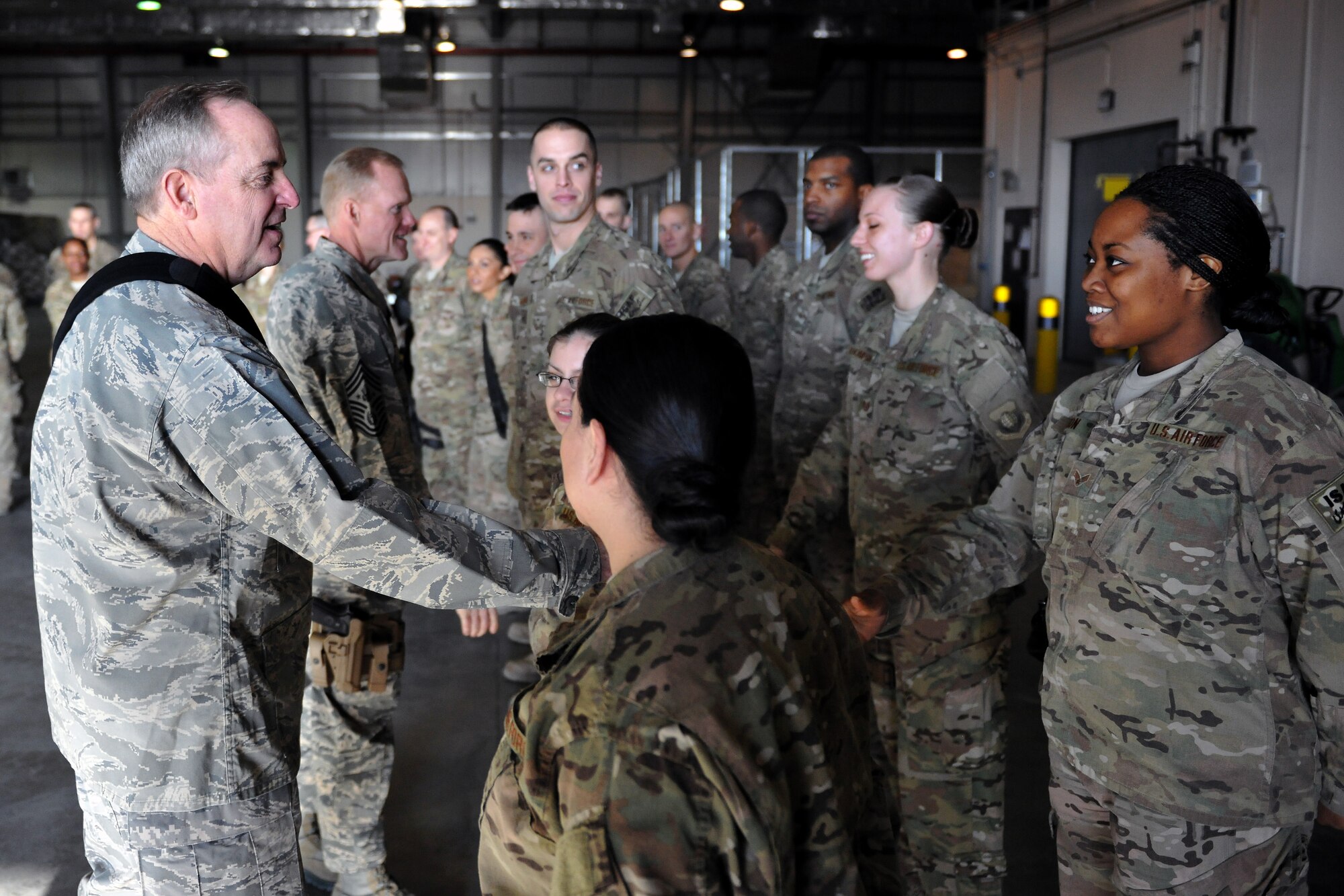 Air Force Chief of Staff Gen. Mark A. Welsh III and Chief Master Sgt. of the Air Force James Cody meet with Airmen of the 455th Expeditionary Aerial Port Squadron at Bagram Airfield, Afghanistan, Feb. 7, 2013. Welsh and Cody visited as a part of a multi-base tour to meet with Airmen throughout the U.S. Central Command area of responsibility. (U.S. Air Force photo/Senior Airman Chris Willis)