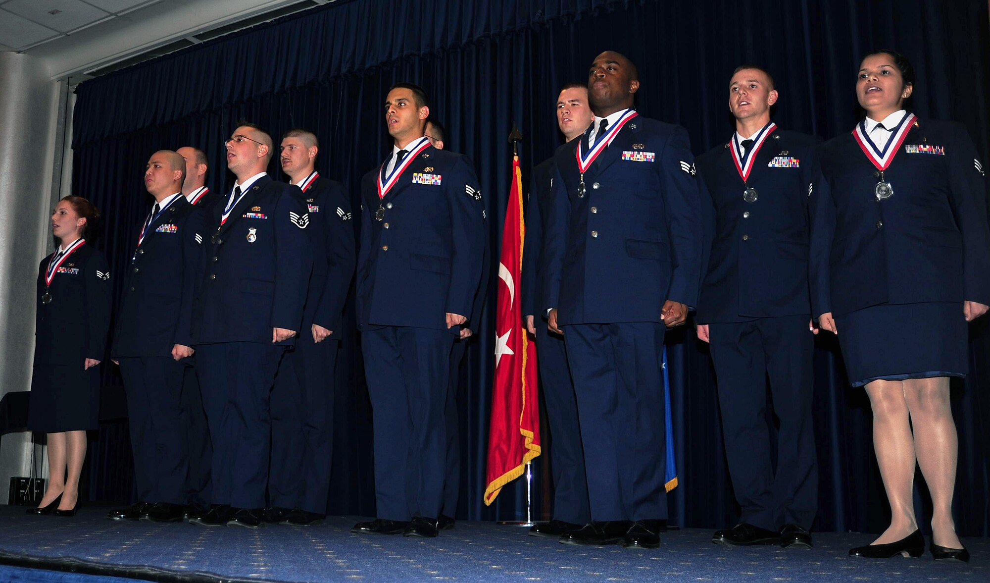 Students of Airmen Leadership School Class 13-2 recite the Airman's Creed during the graduation ceremony Feb. 7, 2013, at Incirlik Air Base, Turkey. There are four levels of PME: ALS, NCO Academy, Air Force Senior NCO Academy and Chief Master Sergeant Leadership Course. (U.S. Air Force photo by Senior Airman Anthony Sanchelli/Released)