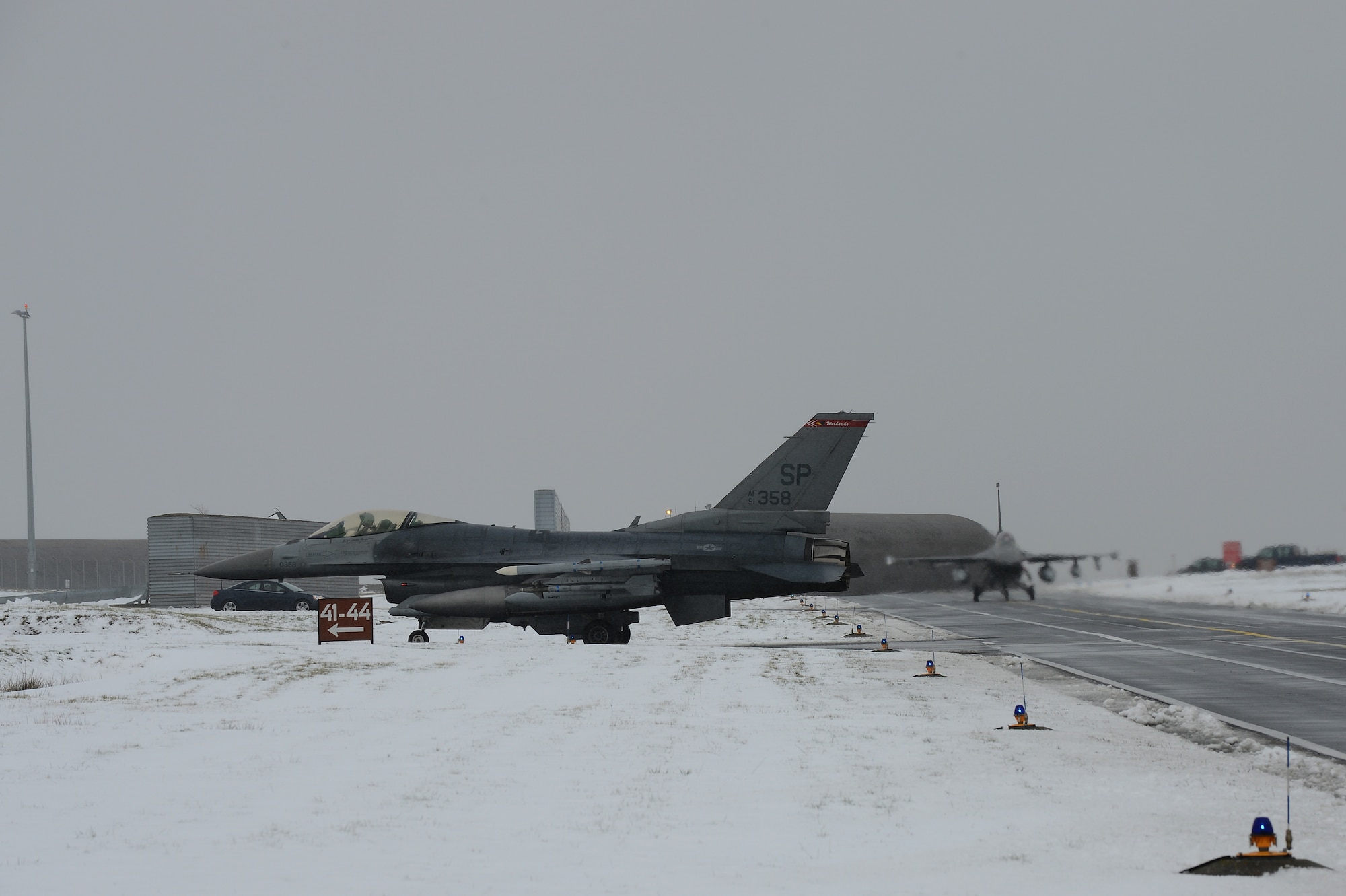 SPANGDAHLEM AIR BASE, Germany – An F-16 Fighting Falcon from the 480th Fighter Squadron taxis to a hardened aircraft shelter after returning from Red Flag Feb. 6, 2013. Pilots from the 480th FS participated in Red Flag to train and prepare for real-world combat scenarios and maintain a viable combat power. (U.S. Air Force photo by Senior Airman Dillon Davis/Released)