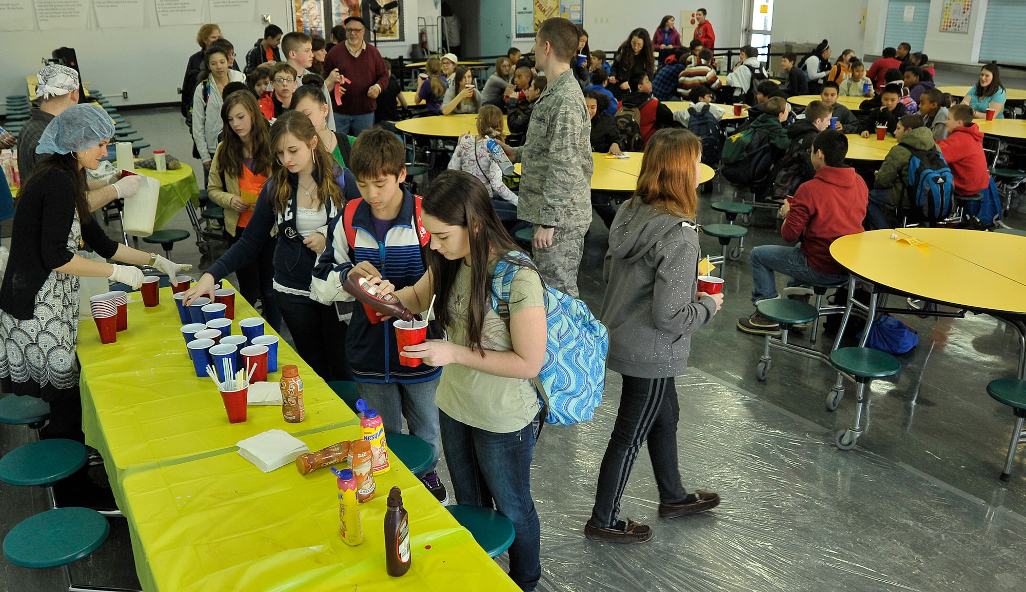 Middle school students fill the cafeteria after school during the first Club Beyond meeting to kick off the year at Misawa Air Base, Japan, Feb. 1, 2013. Since 1980, Club Beyond has served teens on over 45 military installations in the U.S., Europe and Asia. (U.S. Air Force photo by Staff Sgt. Nathan Lipscomb)