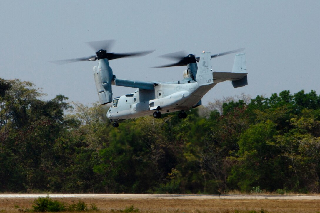 An MV-22B Osprey prepares to land at Wing One Royal Thai Air Force Base, Nakhon Ratchasima, Kingdom of Thailand, Feb. 8 in preparation for exercise Cobra Gold 2013. The exercise is designed to advance regional security and build capacity to effectively respond to regional crises by exercising a robust multinational force from nations sharing common goals and security commitments in the Asia-Pacific region. The aircraft is assigned to Marine Medium Tiltrotor Squadron 265, Marine Aircraft Group 36, 1st Marine Aircraft Wing, III Marine Expeditionary Force. (U.S. Marine Corps photo by Lance Cpl. Todd F. Michalek/Released)