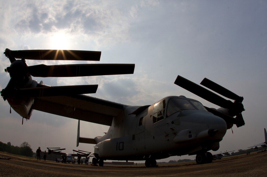 An MV-22B Osprey is parked on the runway of Wing One Royal Thai Air Force Base, Nakhon Ratchasima, Kingdom of Thailand, Feb. 8 after arriving for exercise Cobra Gold 2013. CG 13 is designed to advance regional security and build capacity to effectively respond to regional crises by exercising a robust multinational force from nations sharing common goals and security commitments in the Asia-Pacific region. The aircraft is assigned to Marine Medium Tiltrotor Squadron 265, Marine Aircraft Group 36, 1st Marine Aircraft Wing, III Marine Expeditionary Force. (U.S. Marine Corps photo by Lance Cpl. Todd F. Michalek/Released)