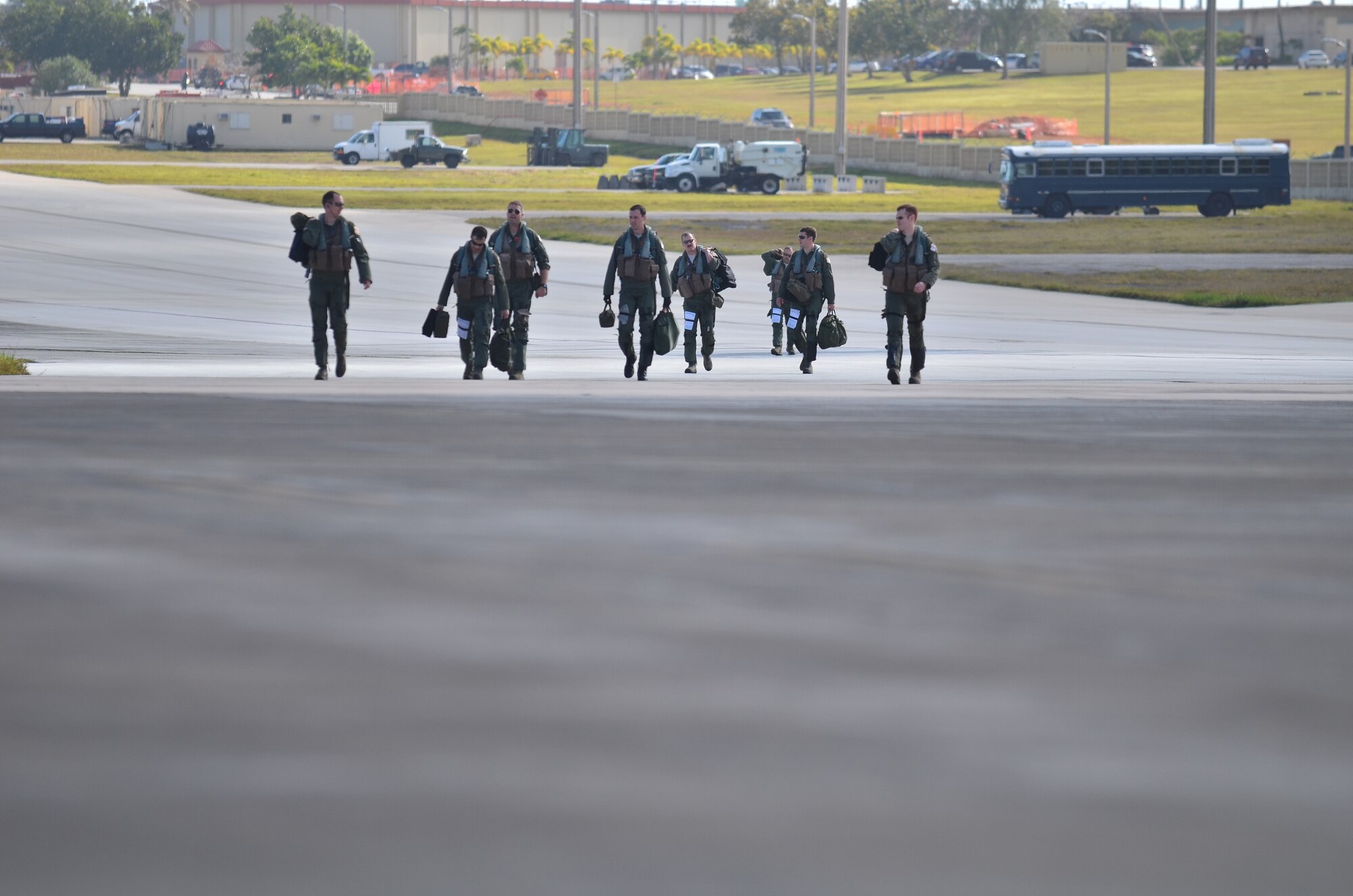 U.S. Air Force Airmen from 354th Fighter Wing, Eielson Air Force Base, Alaska, walk to their U.S. Air Force F-16 aircrafts to prepare for take off during Cope North 2013 at Andersen Air Force Base, Guam Feb 8. 2013. Cope North is an annual air combat tactics, humanitarian assistance and disaster relief exercise designed to increase the readiness and interoperability of the U.S. Air Force, Japan Air Self-Defense Force and Royal Australian Air Force. (U.S. Air Force photo by Staff Sgt. Alex Montes/RELEASED)