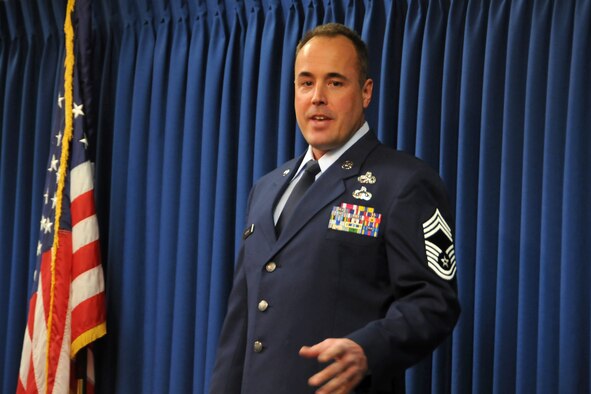 JOINT BASE ELMENDORF-RICHARDSON, Alaska -- Newly-promoted Chief Master Sgt. Karl Howard, a 176 Maintenance Squadron chief, speaks at his promotion ceremony here Feb. 9. National Guard photo by Staff Sgt. N. Alicia Goldberger.
