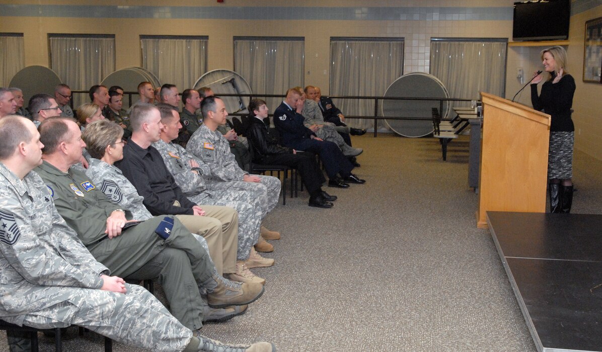 Over 100 Guard members listened to a motivational speech by former Miss America 1985, Sharlene Wells-Hawkes, during the 5th Annual Interfaith Devotional at the Utah Air National Guard Base Feb. 10. During her speech, “Building and Sustaining Faith,” Hawkes illustrated the similarities between faith and military training. (U.S. Air Force photo by Staff Sgt. Lillian Harnden)(RELEASED)