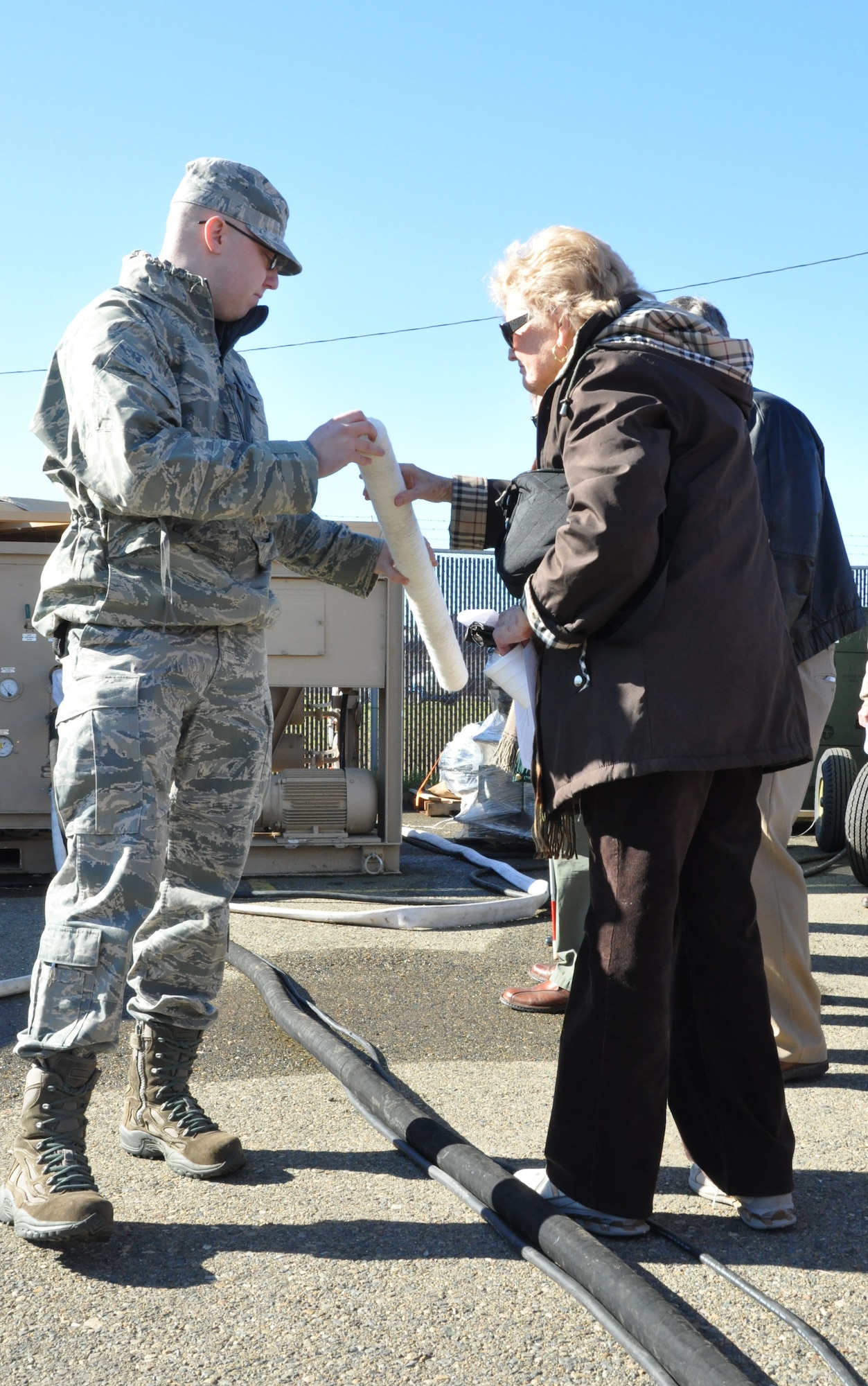 Senior Airman Richard Davis, 940th Wing CEF, explains how civil engineers purify water in a depolyed environment during a tour here at Beale AFB. SrA Davis and other members of the 940th wing hosted the California Retired Teachers Assoc. over the UTA weekend. (U.S. Air Force photo/SrA Adam Hamar)