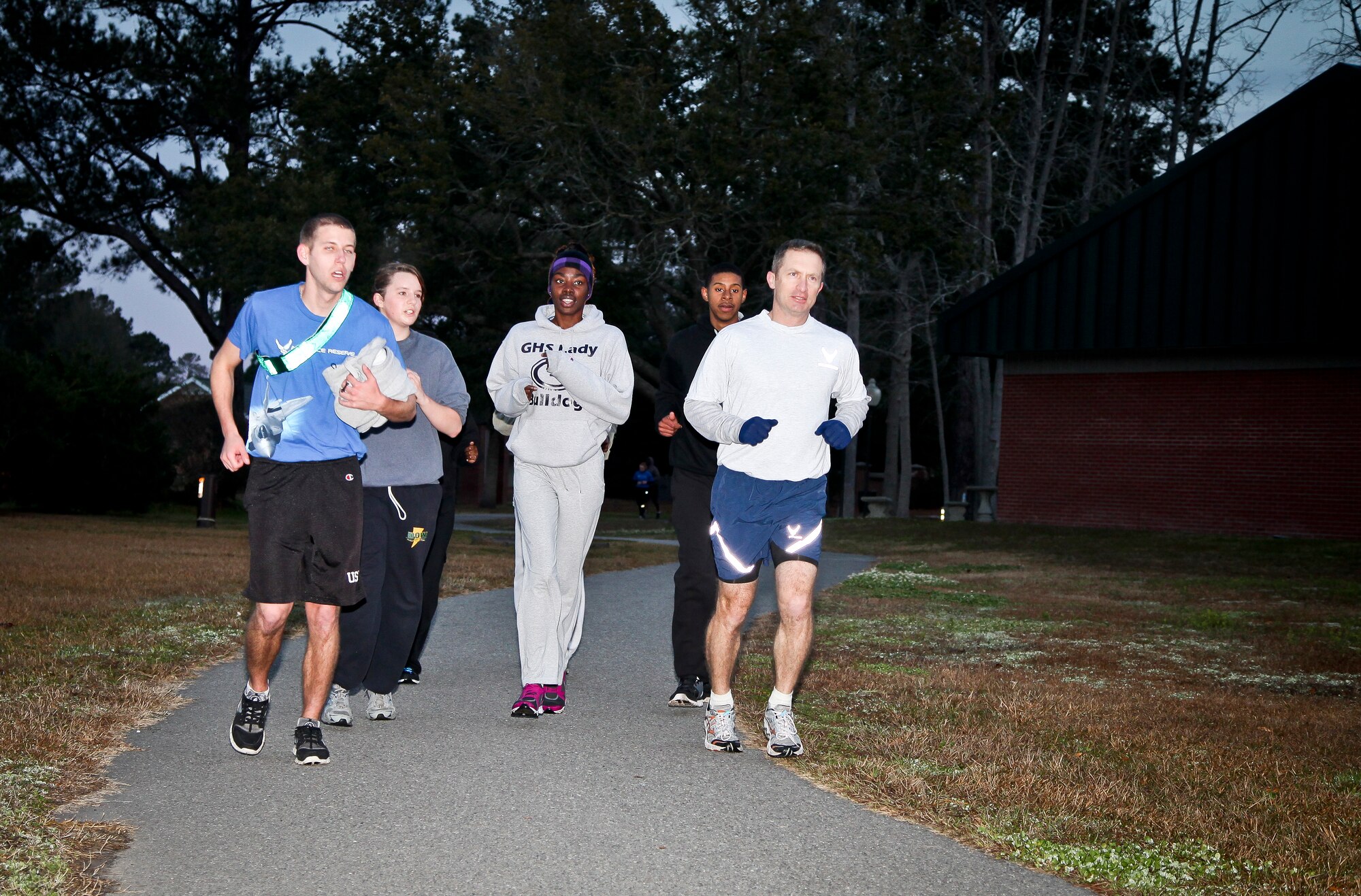 315th Airlift Wing commander Col. James Fontanella trains with the wing's developmental training flight today on the McCombs running path here at Joint Base Charleston, S.C. Fontanella took part in the run in an effort to encourage the trai...nee's as they prepared for the physical training demands they will face when they arrive at basic military training at Lackland Air Force Base in San Antonio. The developmental training flight trains future airmen, who have enlisted and are awaiting placement in BMT, in customs and courtesies, Air Force traditions as well as physical training. The goal of the DTF program is to increase the success rate of new members entering BMT and to prepare the them for life as reservists. (U.S. Air Force photo's by Staff Sgt. Rashard Coaxum/released)