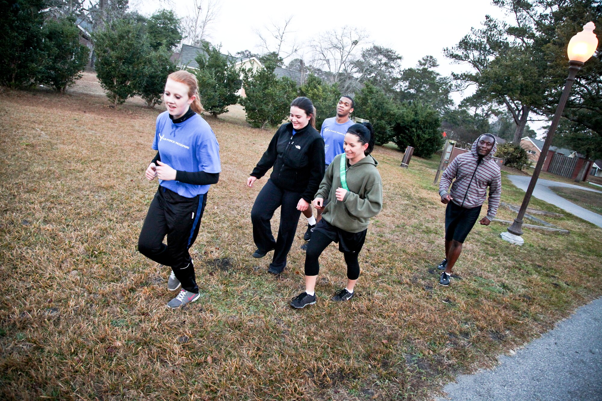 315th Airlift Wing commander Col. James Fontanella trains with the wing's developmental training flight today on the McCombs running path here at Joint Base Charleston, S.C. Fontanella took part in the run in an effort to encourage the trai...nee's as they prepared for the physical training demands they will face when they arrive at basic military training at Lackland Air Force Base in San Antonio. The developmental training flight trains future airmen, who have enlisted and are awaiting placement in BMT, in customs and courtesies, Air Force traditions as well as physical training. The goal of the DTF program is to increase the success rate of new members entering BMT and to prepare the them for life as reservists. (U.S. Air Force photo's by Staff Sgt. Rashard Coaxum/released)