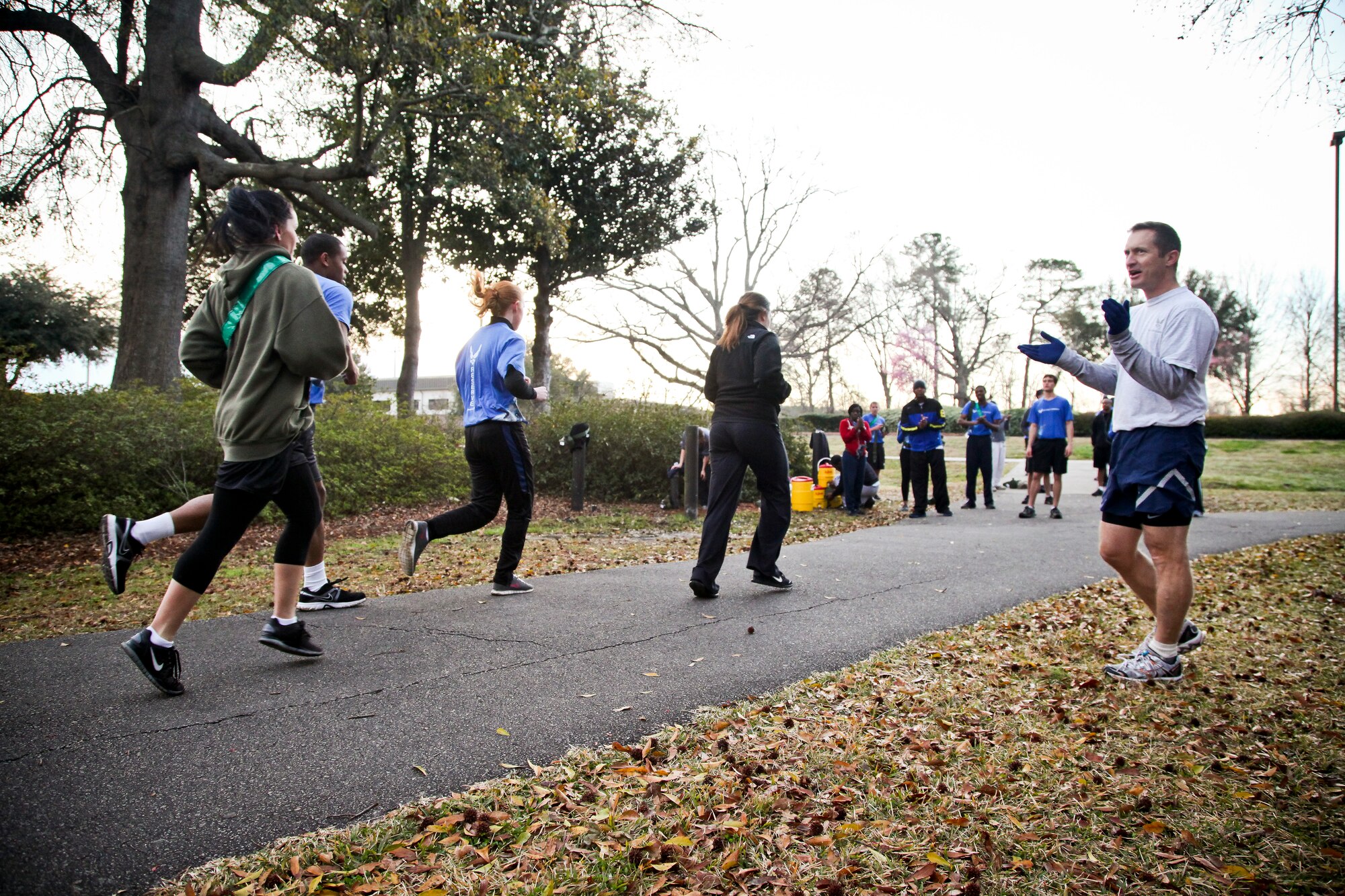 315th Airlift Wing commander Col. James Fontanella trains with the wing's developmental training flight today on the McCombs running path here at Joint Base Charleston, S.C. Fontanella took part in the run in an effort to encourage the trai...nee's as they prepared for the physical training demands they will face when they arrive at basic military training at Lackland Air Force Base in San Antonio. The developmental training flight trains future airmen, who have enlisted and are awaiting placement in BMT, in customs and courtesies, Air Force traditions as well as physical training. The goal of the DTF program is to increase the success rate of new members entering BMT and to prepare the them for life as reservists. (U.S. Air Force photo's by Staff Sgt. Rashard Coaxum/released)