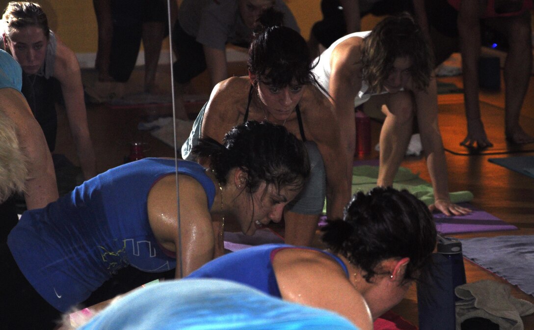 Sgt. Yari Kobus leads a Hot Yoga class at the Stafford House of Yoga in Stafford on Jan. 26. 