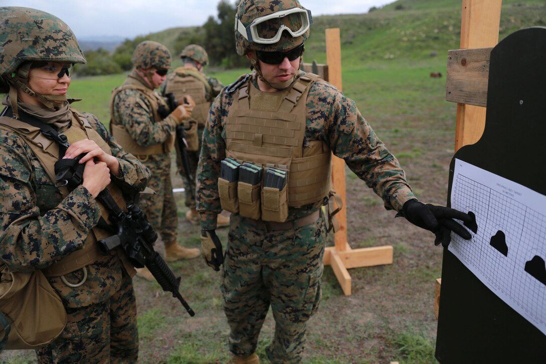 Marines with the 11th Marine Expeditionary Unit execute a Table 3 shooting exercise here Feb 6.  Table 3 markmanship gives the Marines an opportunity to hone their rifle skills by shooting targets while on the move.  The targets are from distances of 5, 10, 15 and 25 yards.