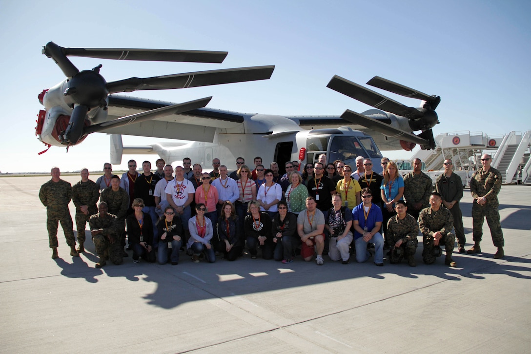 Midwest Marines pose with educators from Recruiting Station Twin Cities during a flight line tour Jan. 30. Forty educators from Minnesota and the Dakotas flew to California for a Marine Corps educators workshop. For additional imagery from the event, visit www.facebook.com/rstwincities. 