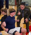 Poolees from Recruiting Substations North Milwaukee, Racine, South Milwaukee and Waukesha competed against each other during their annual Butt Kicking Field Meet Feb. 8.  Events included a pull-up challenge, shuttle run and the culminating tug of war tournament.